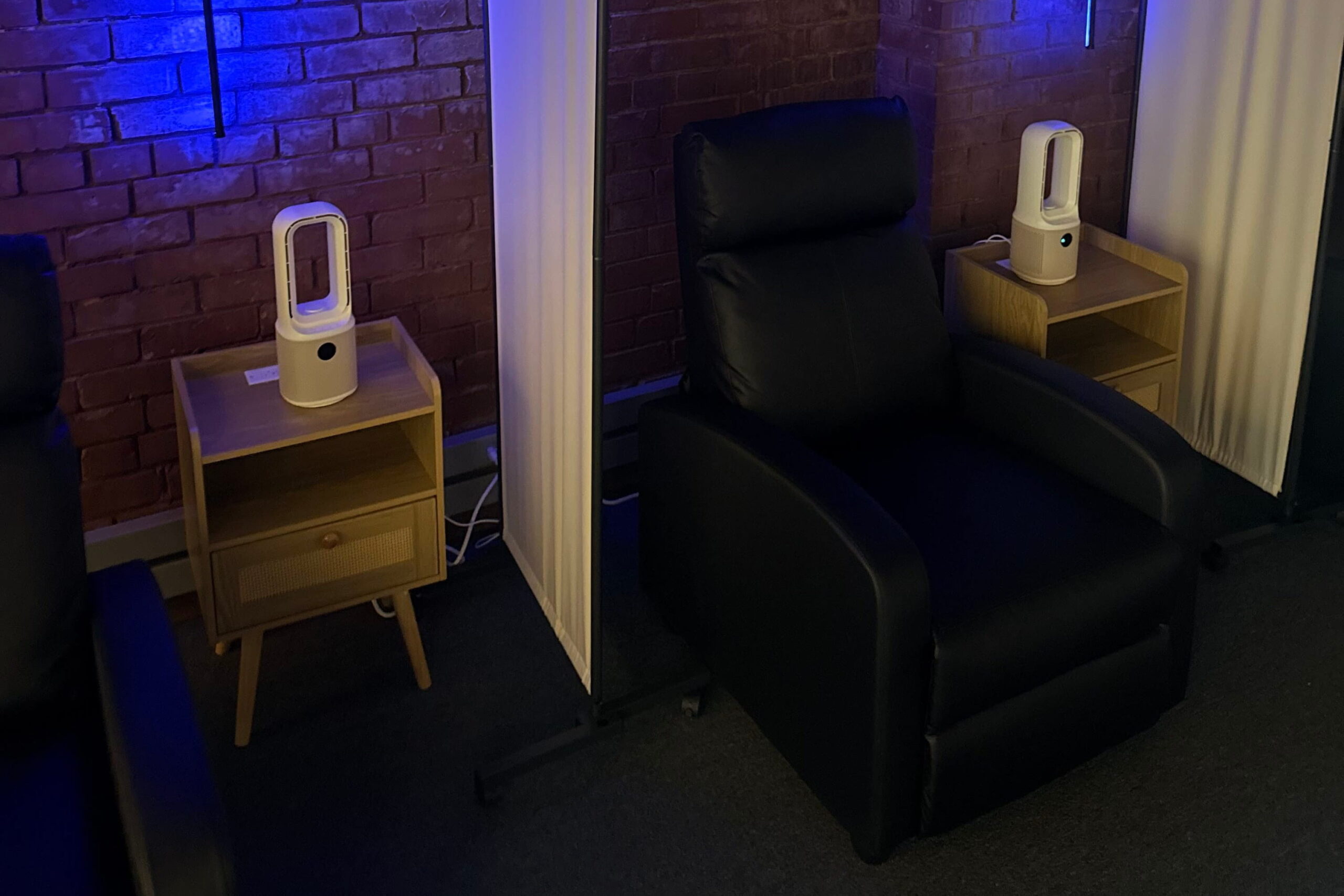 black recliners with blue light at ketamine clinic